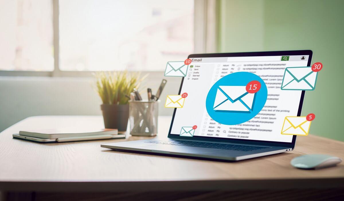 A computer with incoming emails as a result of successful email marketing campaigns